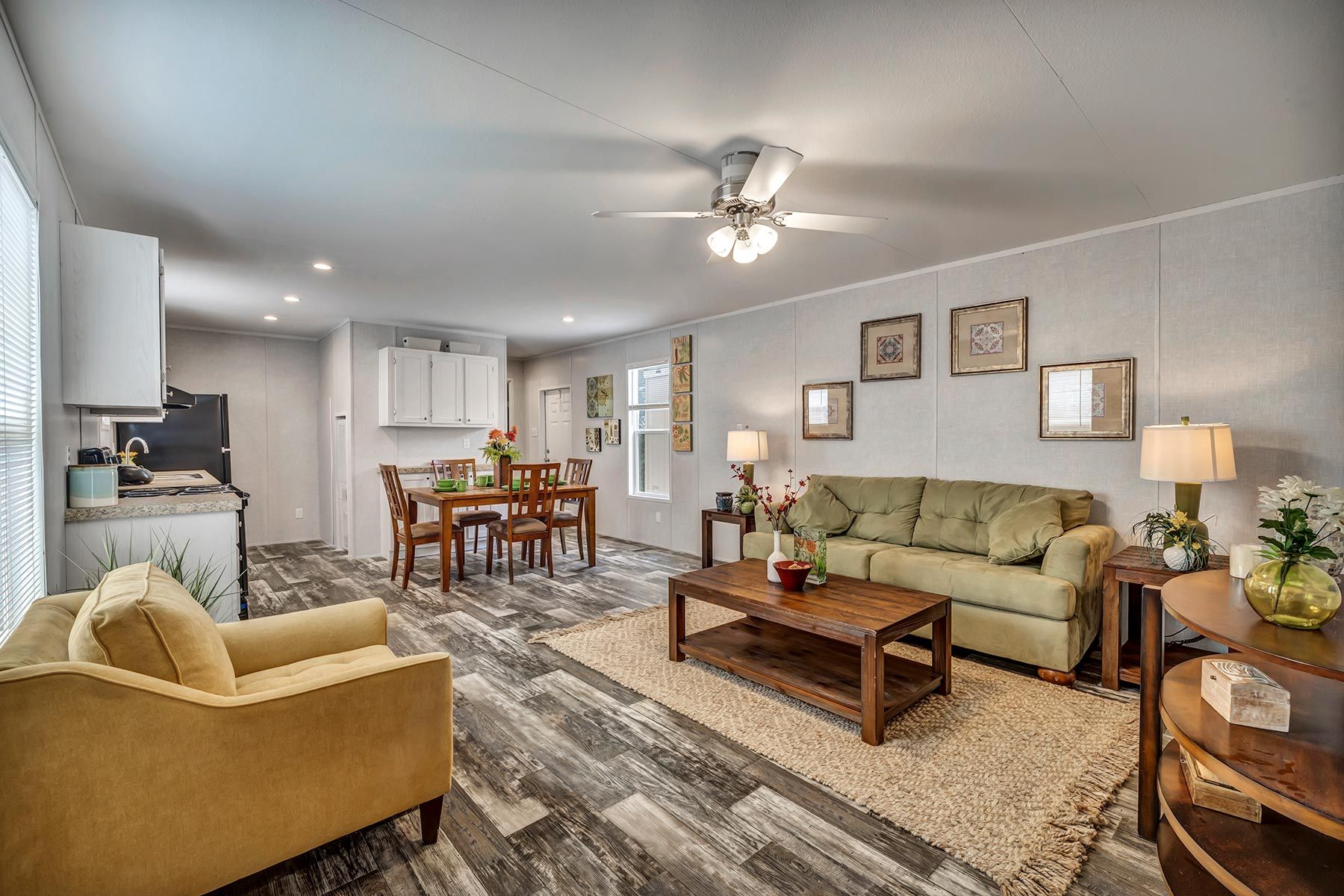 From above of ruler with pencil and glasses placed on paper sheet of house plan for construction